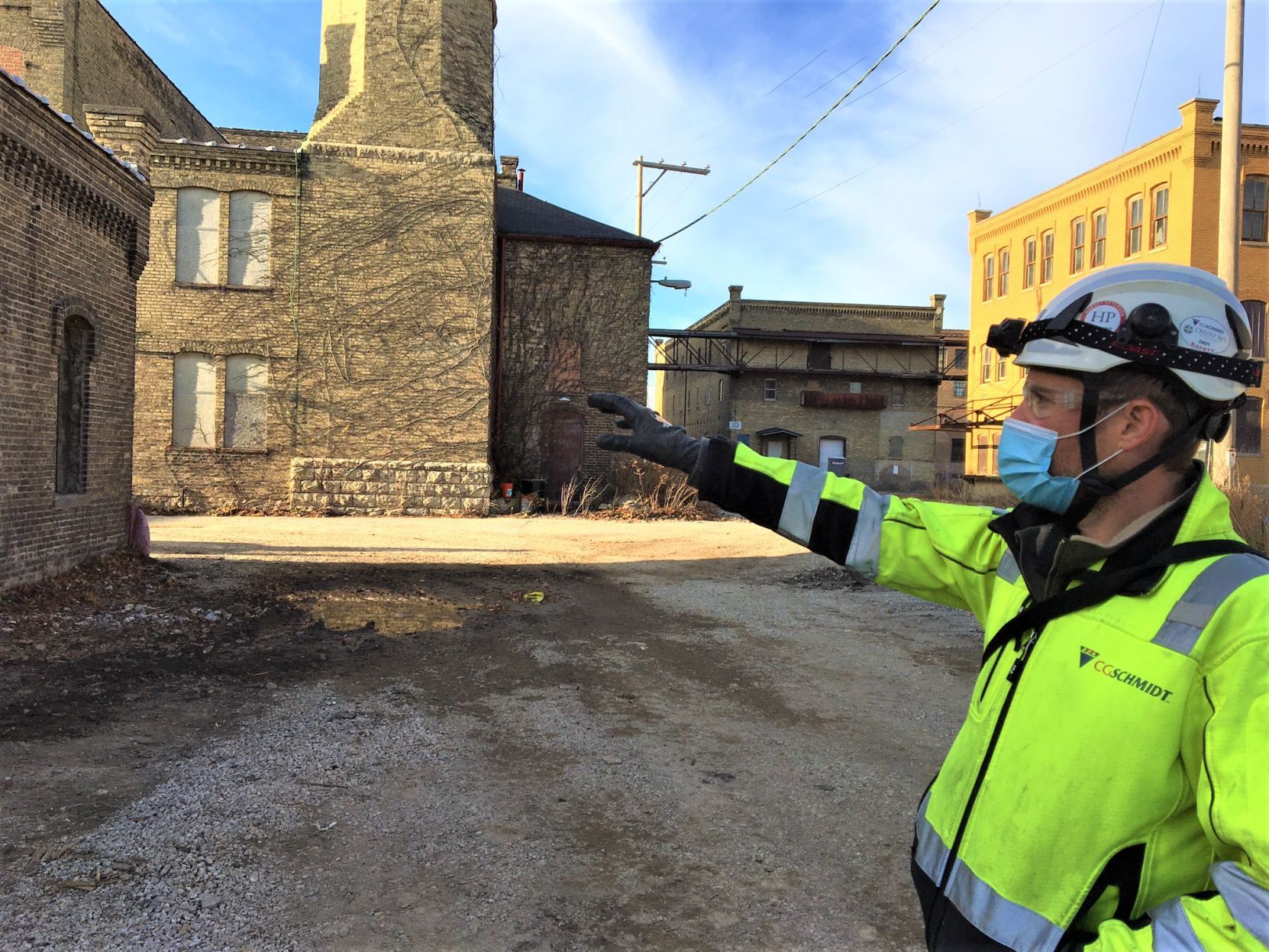 CG Schmidt project superintendent Aaron Smith gives a hard hat tour of the Horlick District redevelopment project